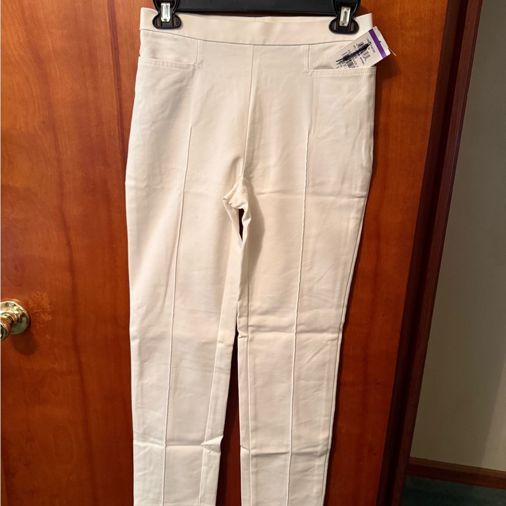Akris Size 2 cream color pants with a side zipper.